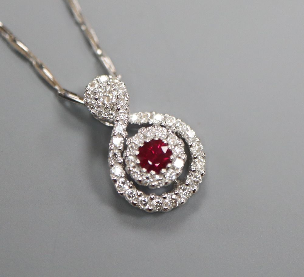 A diamond and ruby 18ct white gold pendant